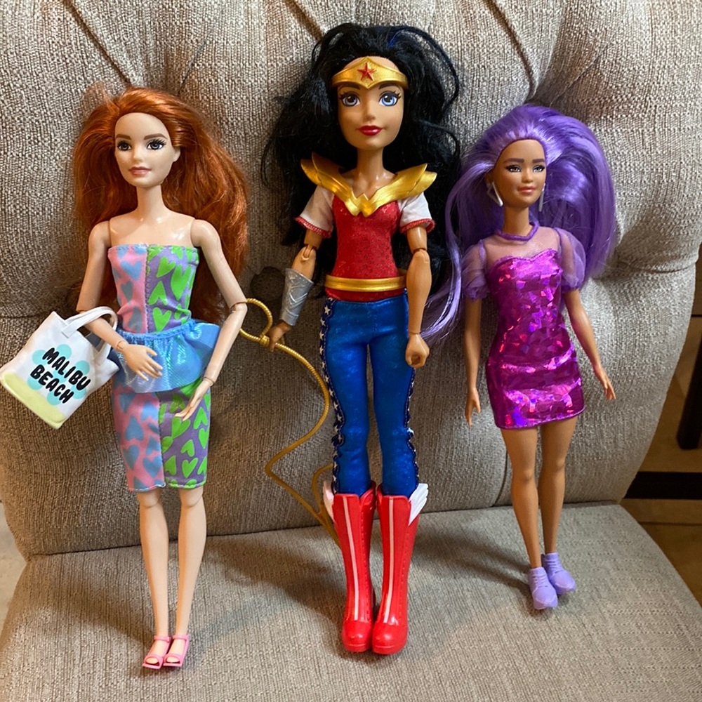 DC Super Hero Wonder Woman collection and 2 Barbie Dolls LIKE NEW